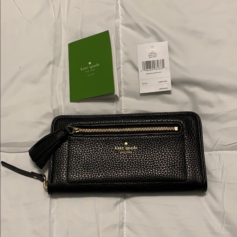 Authentic Kate Spade black leather wallet clutch.